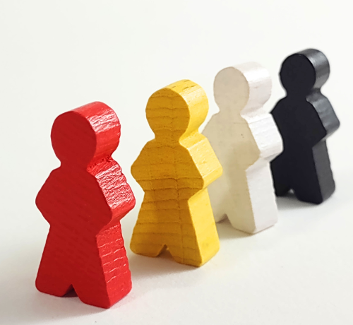 Wooden Meeples from Build Game Box Four wooden meeples