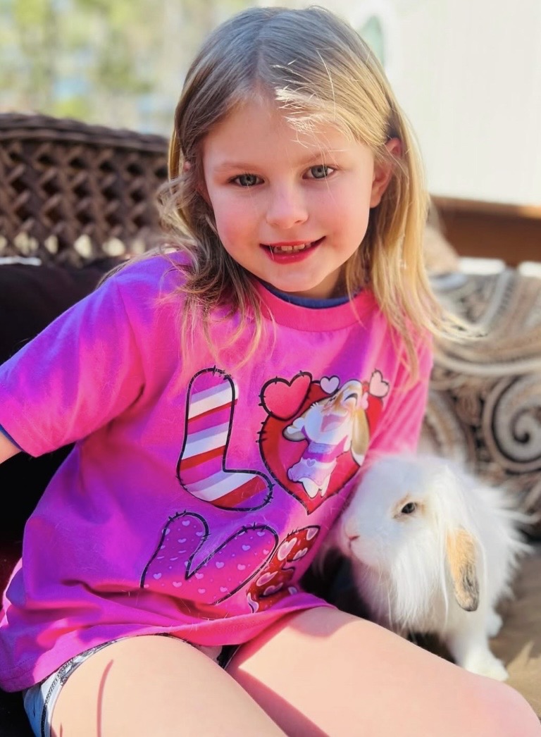 Child wearing colorful Bunny FunBox t-shirt with bunny design