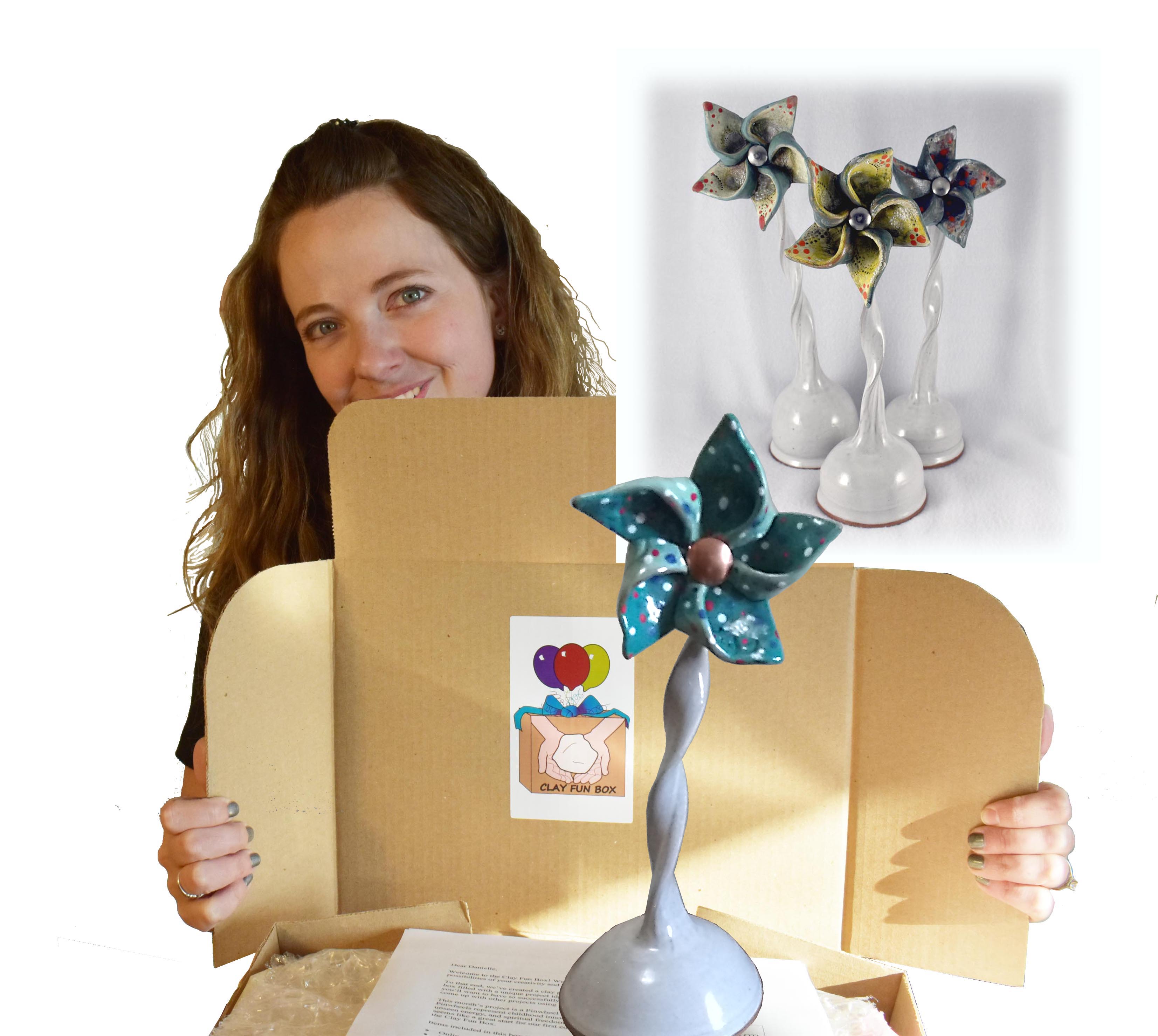 287-danielle-behind-open-box-smiling-pinwheel-on-top-copy-17260923110985.jpg