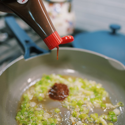 Stir miso glaze into the sauce pan.