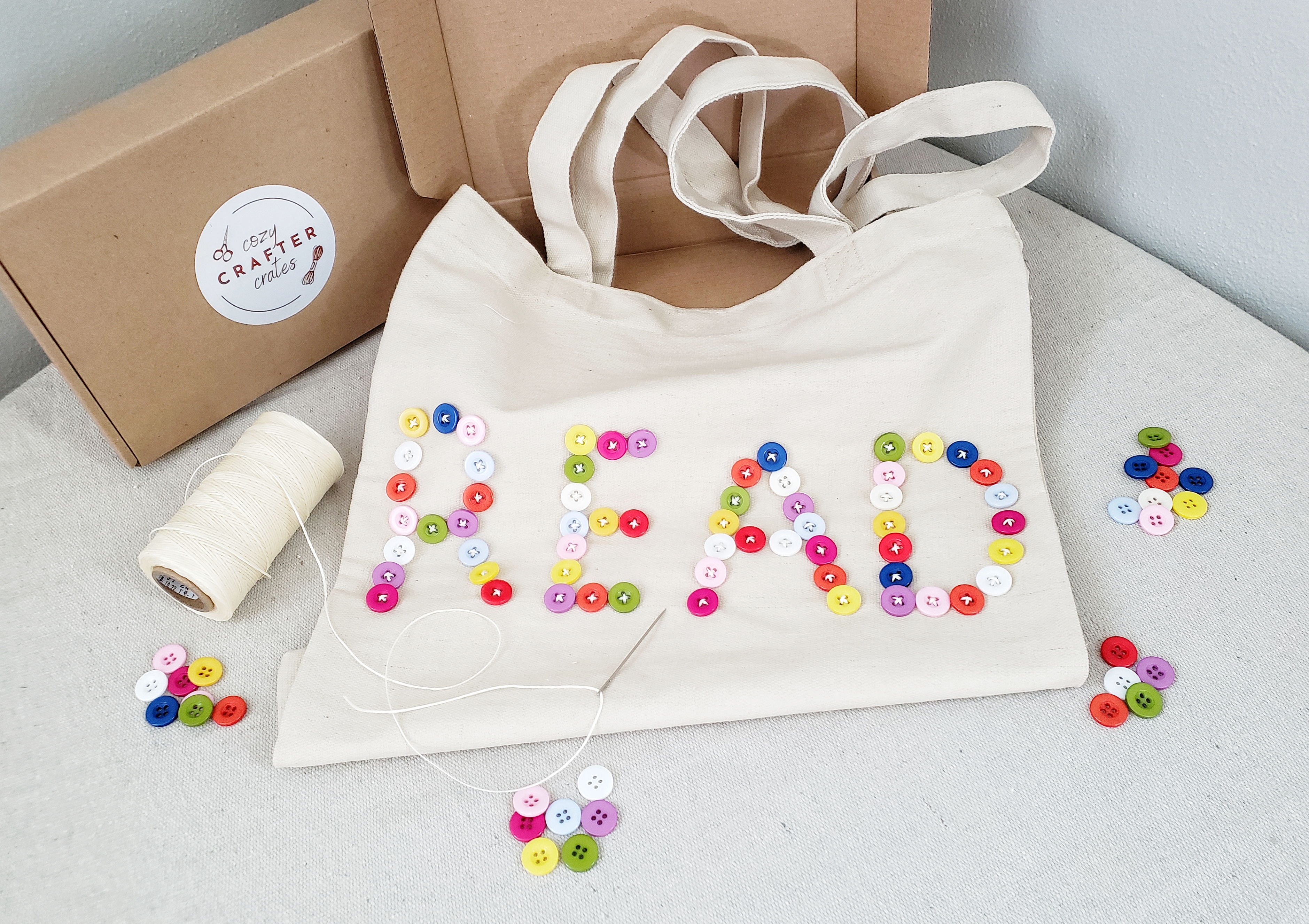 handicraft kit containing all the supplies to learn to sew on buttons