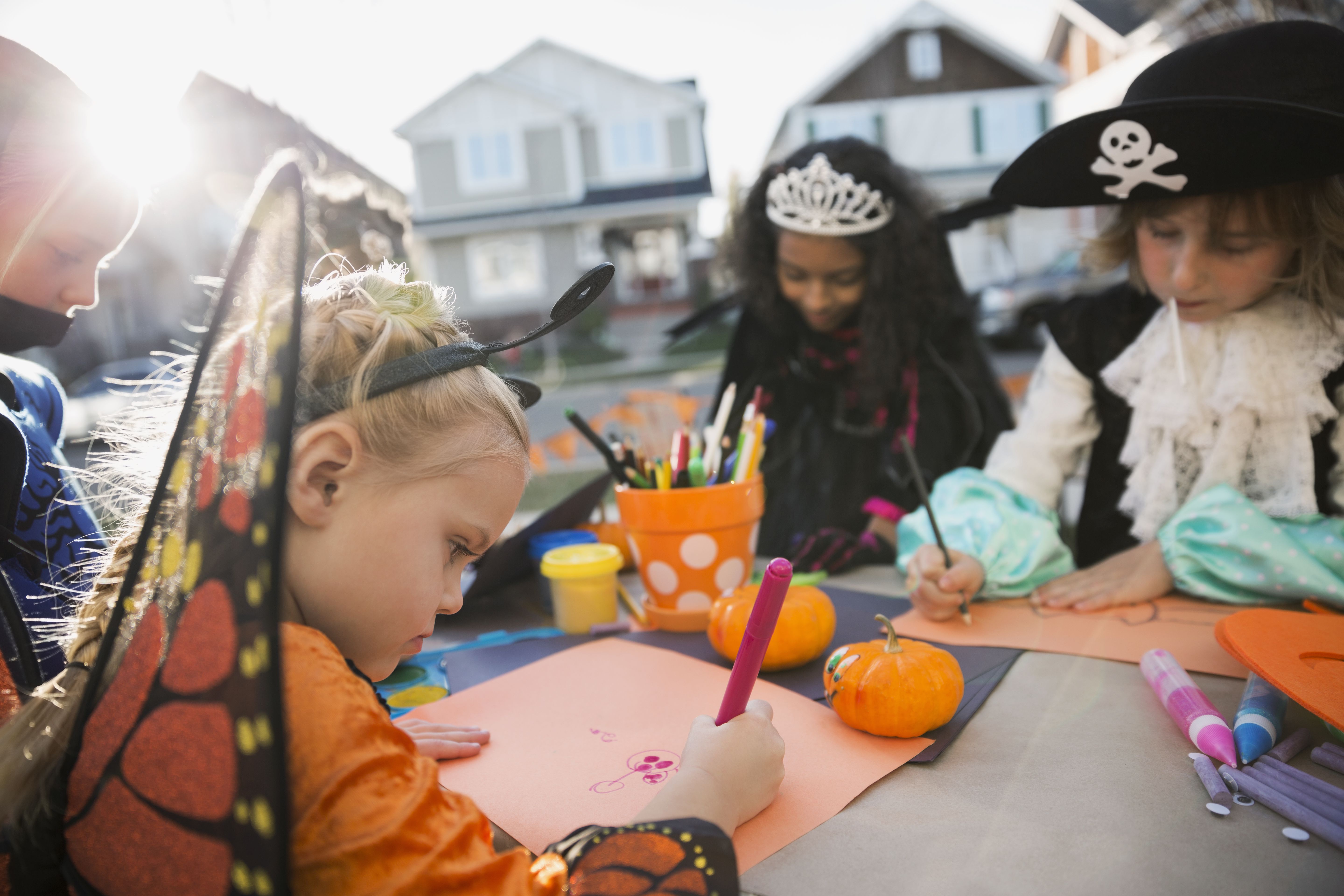 9711-kids-in-halloween-costumes-doing-crafts-front-yard-598522535-5968e7423df78c57f49-17102662511481.jpg