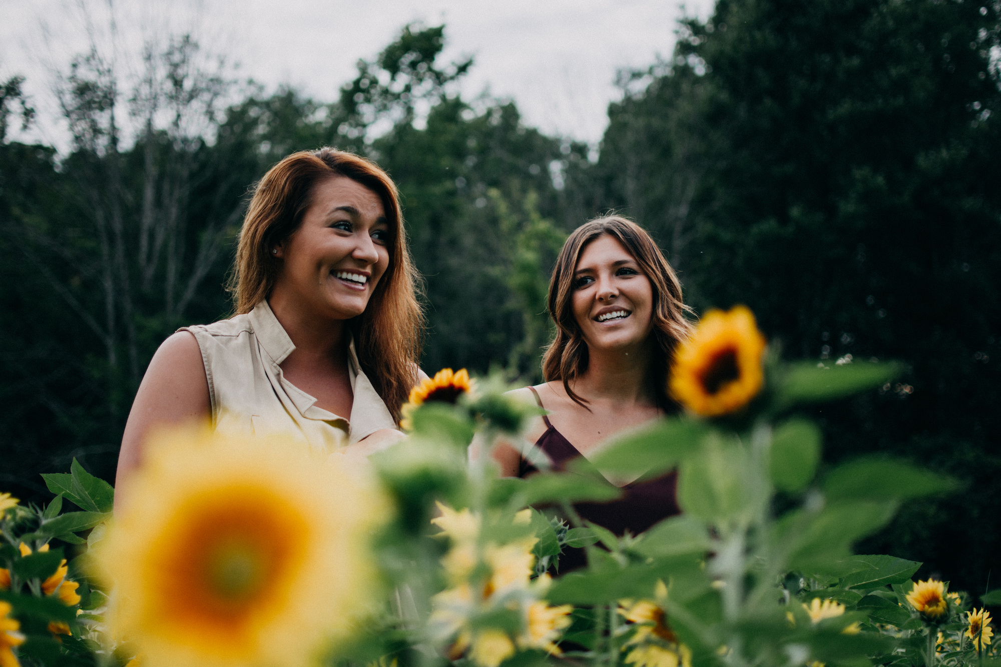 450-canva---two-women-standing-on-sunflower-garden2000px.jpg