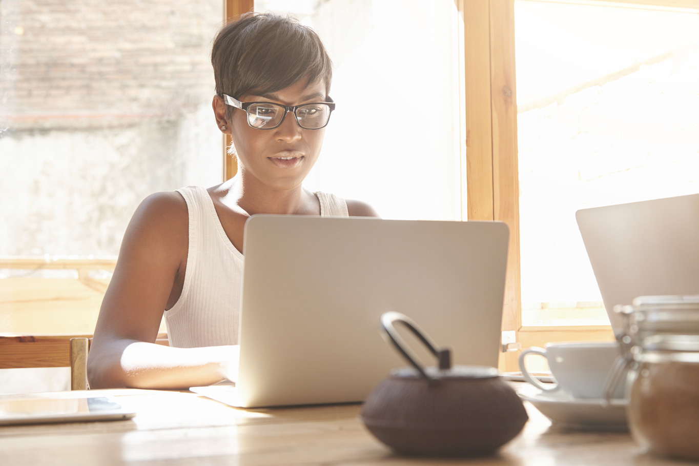 Black Woman Reviewing Guide to Funding