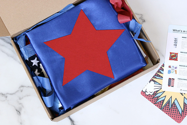 super hero cape from the July 2022 Howdy Baby activity box for kids