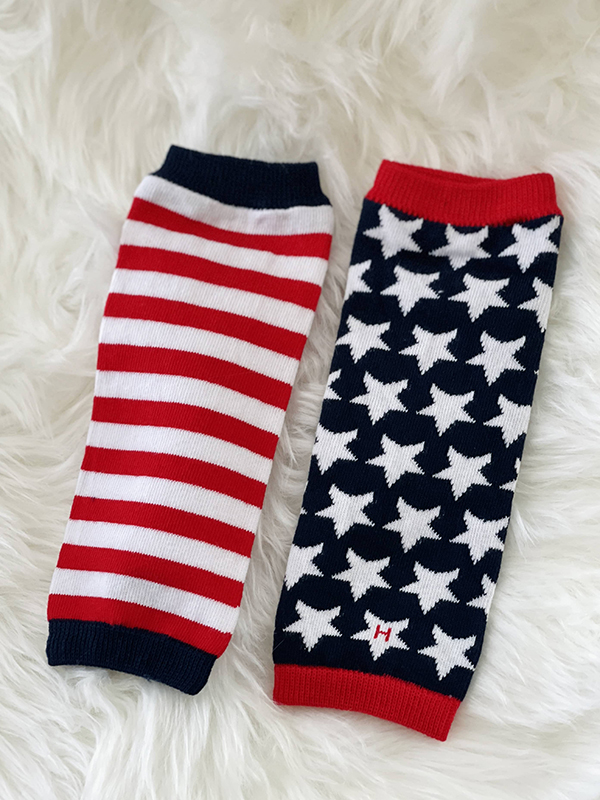stars and stripes leg warmers from the July 2022 Howdy Baby activity box for toddlers