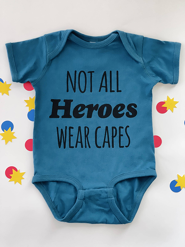 not all heroes wear capes onesie from the Howdy Baby Box activity box for toddlers