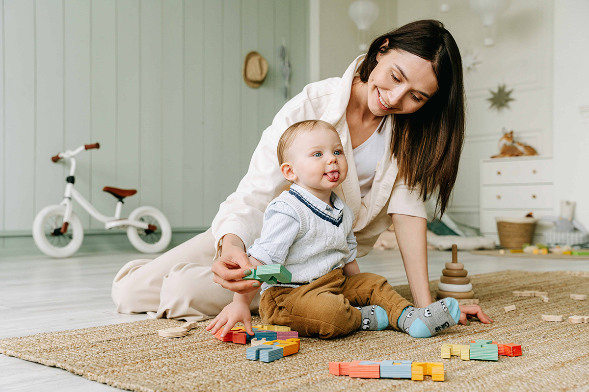 mom and baby engaging in play time activities at home