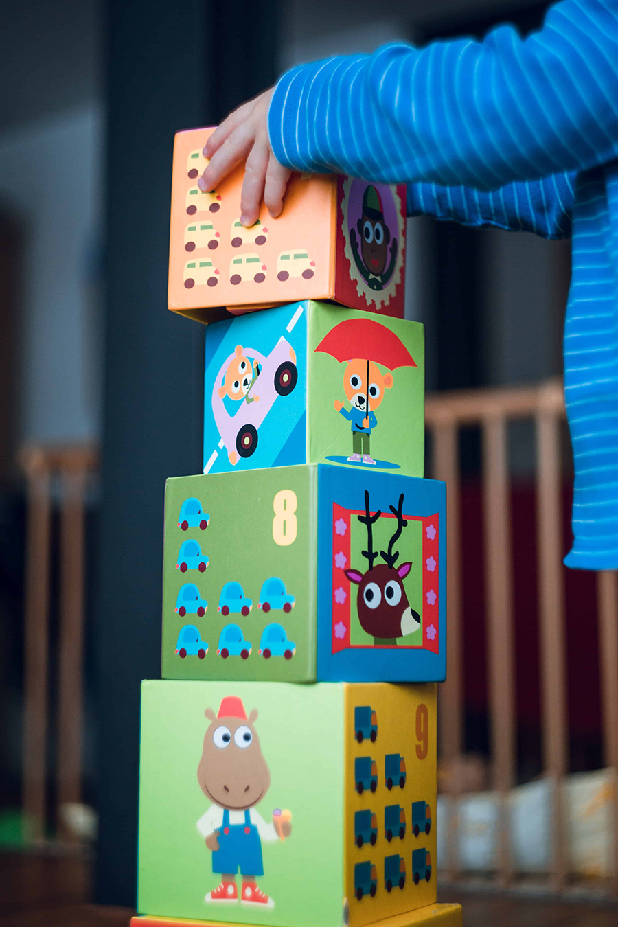 toddler stacking blocks independently