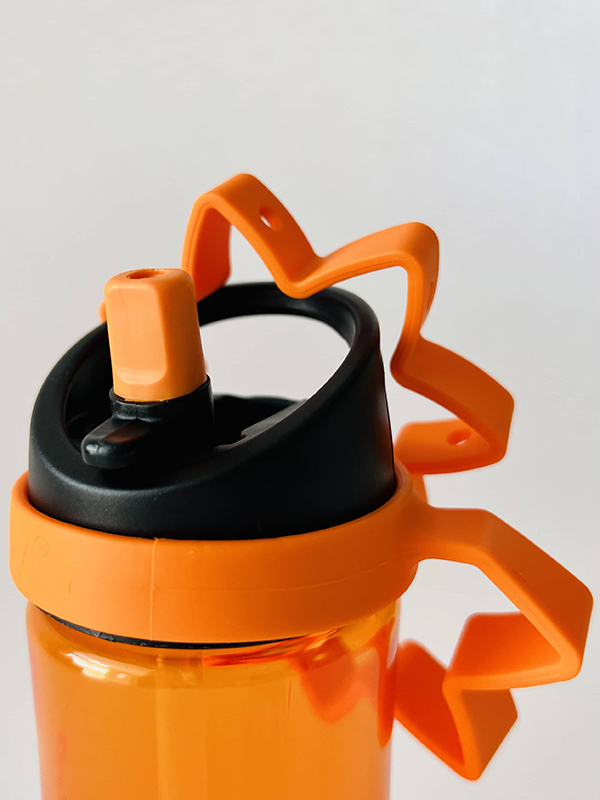 orange baby bottle bungee from the Howdy Baby toy and activity subscription box