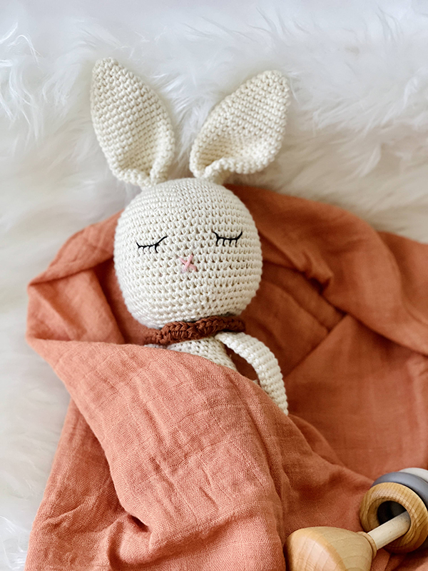 orange muslin swaddle from the Howdy Baby mommy and me toy subscription box
