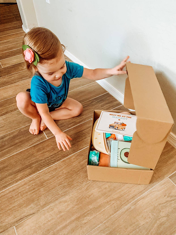 baby toy subscription box customer unboxing