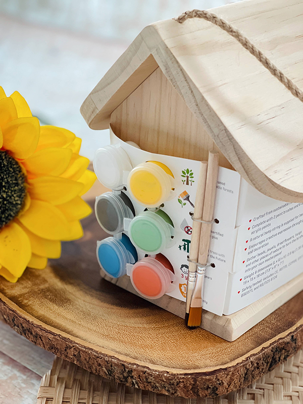 DIY birdhouse craft for kids with paint and paint brushes included