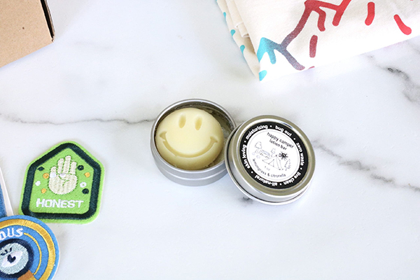 happy camper lotion bar featured in the August 2022 Howdy Baby children's subscription box