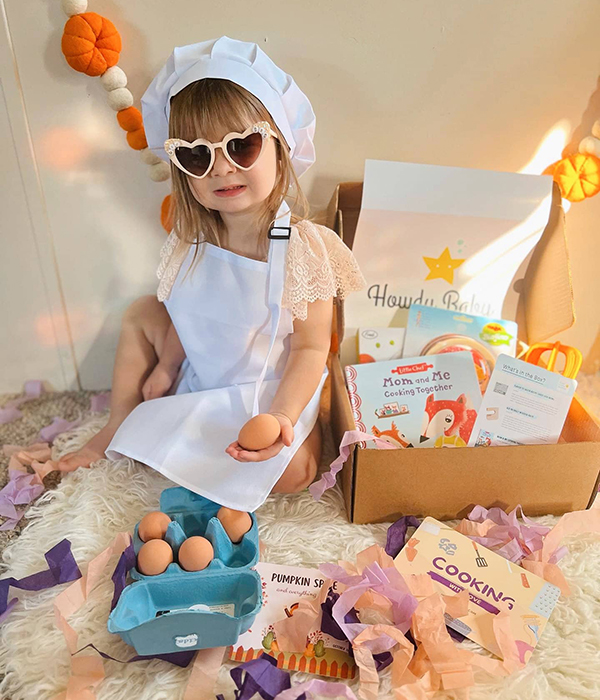 toddler girl opening September 2023 Howdy Baby childrens subscription boxes