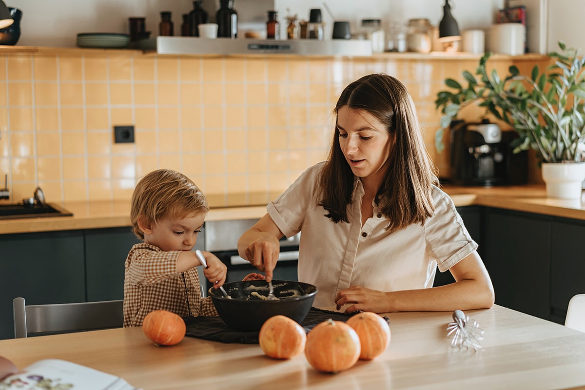 mom and son cooking together