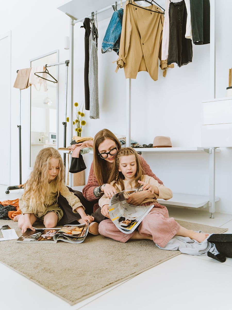 mom and daughters creating a vision board