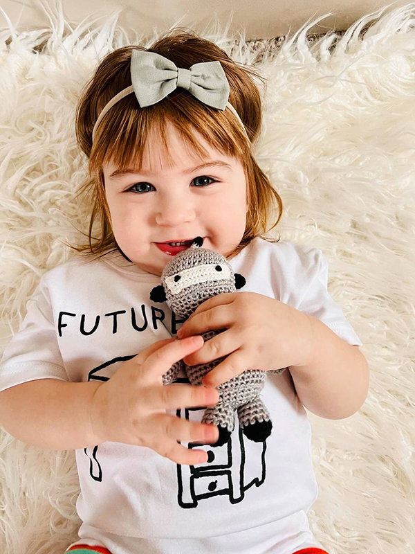 baby girl wearing a Future CEO baby onesie