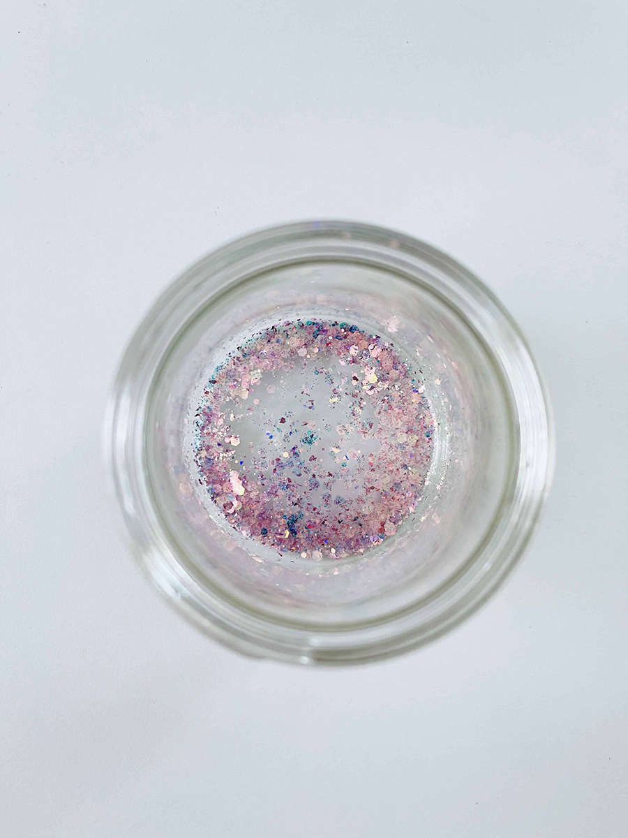 glitter at the bottom of a mason jar