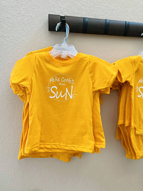 here comes the sun t-shirt from the April 2023 Howdy Baby kids box