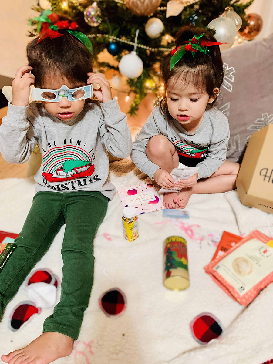 kids wearing 3D play glasses while unboxing howdy kids children's monthly gift box