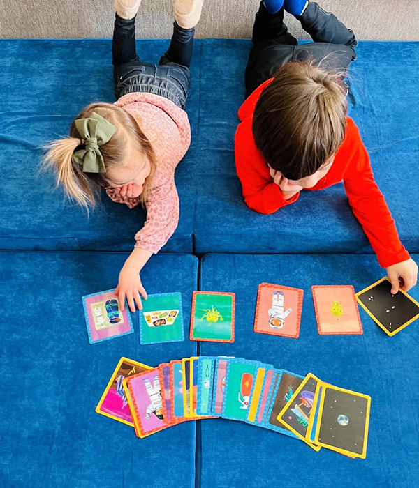kids playing with learning flash cards