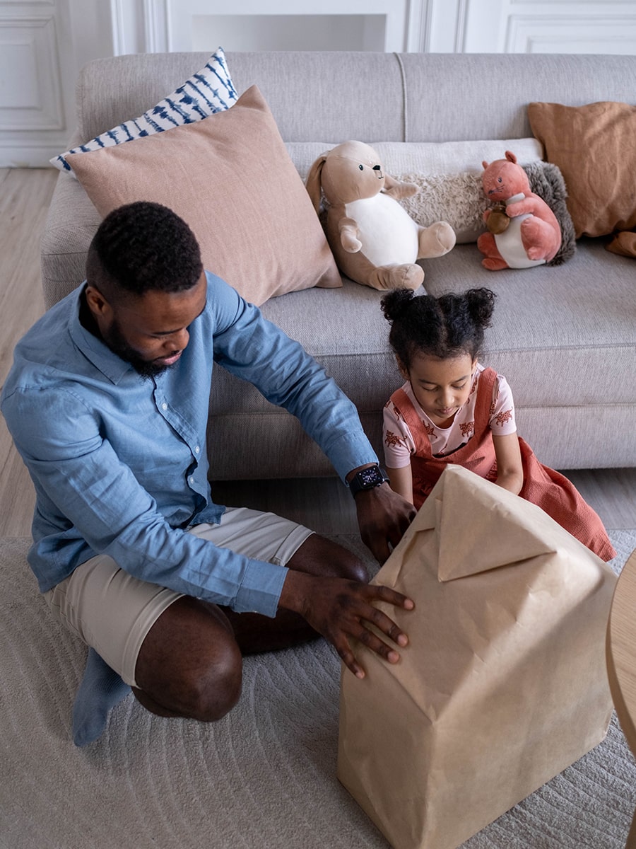 father and daughter making a fort