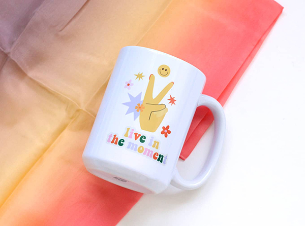 live in the moment mug from the May 2023 Howdy Baby maternity subscription box