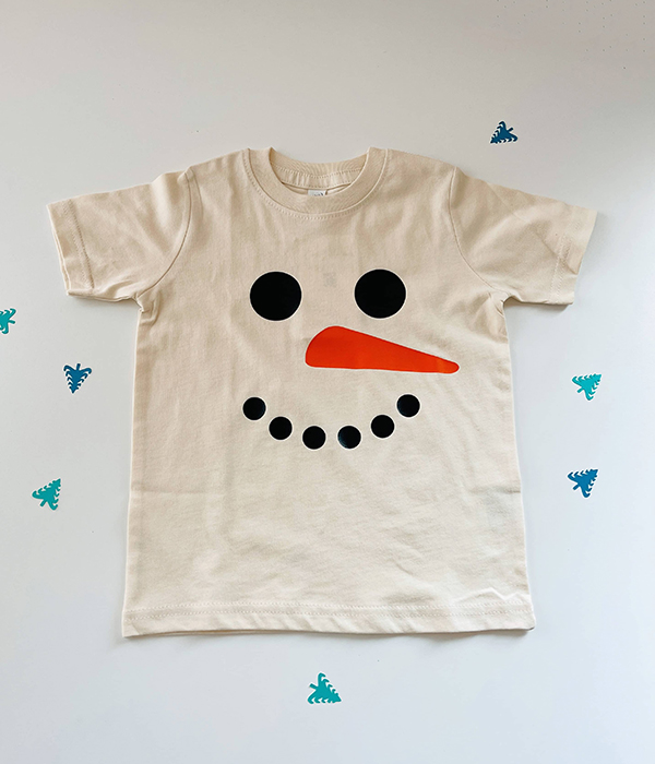 snowman t-shirt from the December 2022 Howdy Baby mom to be box