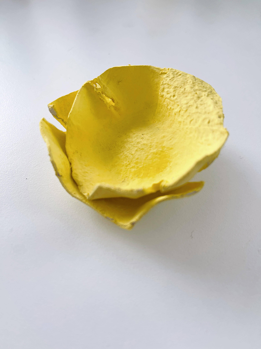 yellow painted egg carton flower