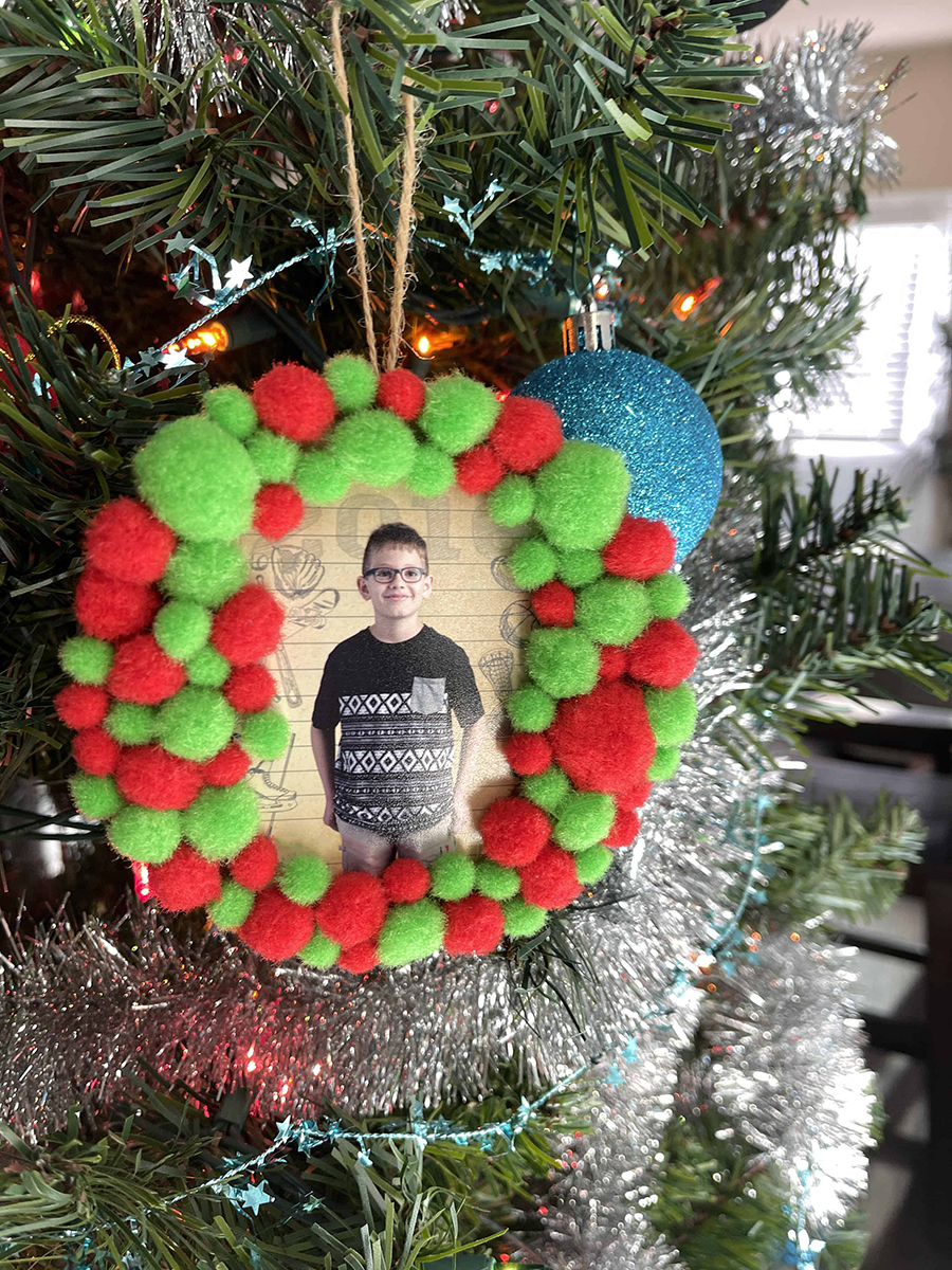 red and green pom pom christmas ornament