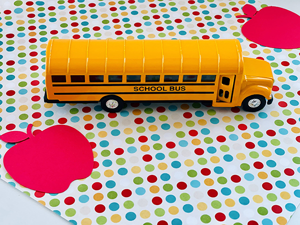yellow school bus pull back toy
