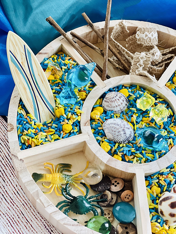 beach themed sensory rice bin for kids