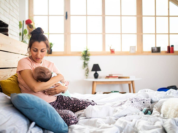 mom singing songs to baby