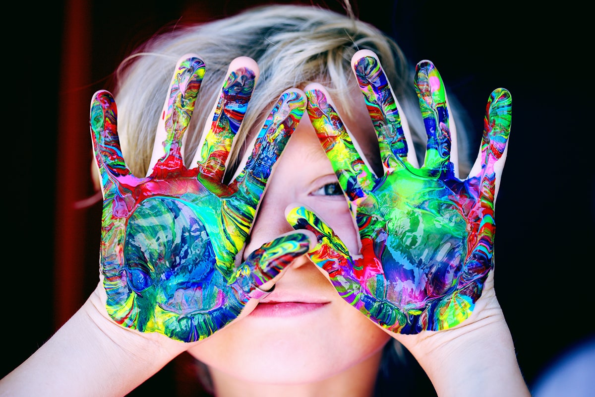 kid playing with slime