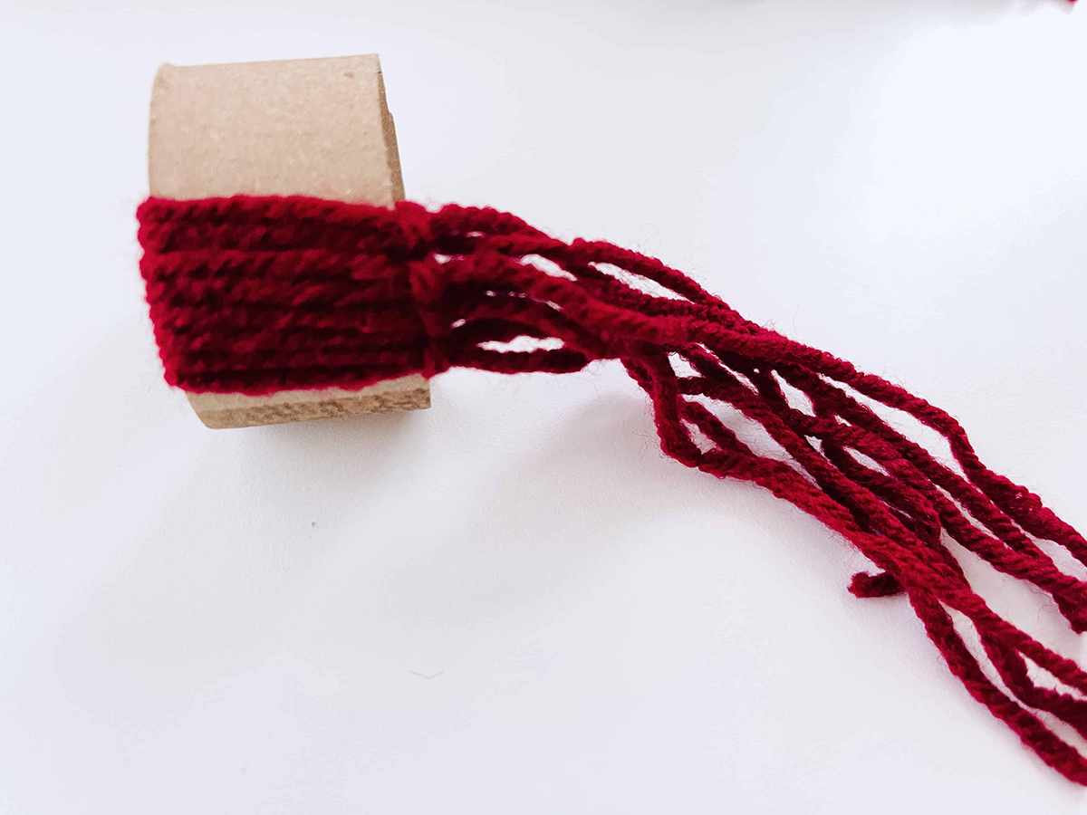 attach yarn to cardboard