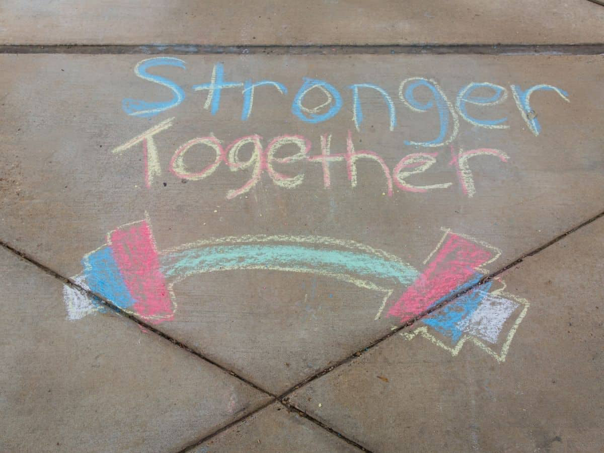 stronger together uplifting sidewalk chalk quote