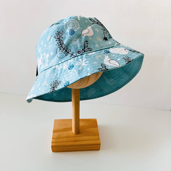 reversible bucket hat from the April 2024 Howdy Baby subscription box for expecting moms