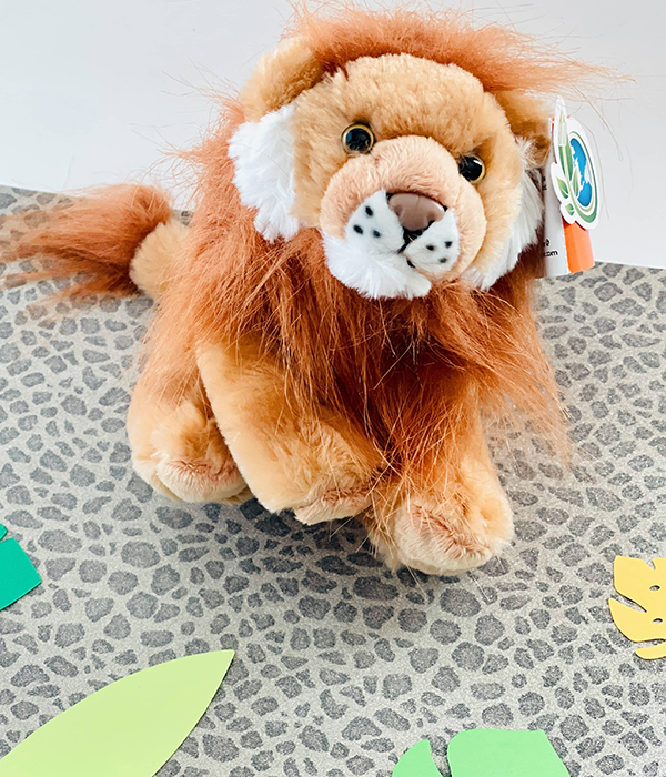 lion plushie from the jungle themed Howdy Baby subscription box for girls and boys