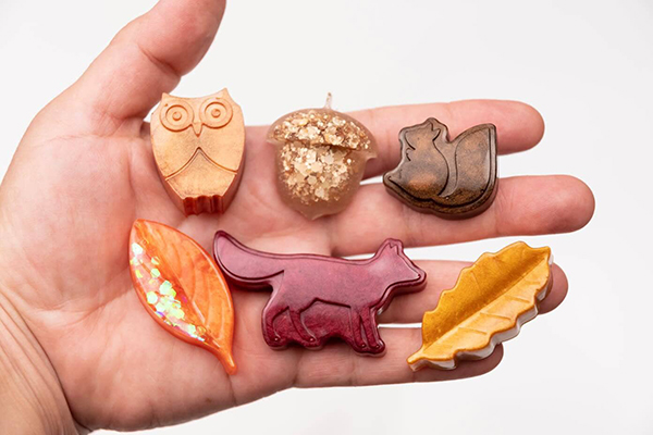 fall resin shapes from the November 2022 Howdy Baby subscription box for moms and kids