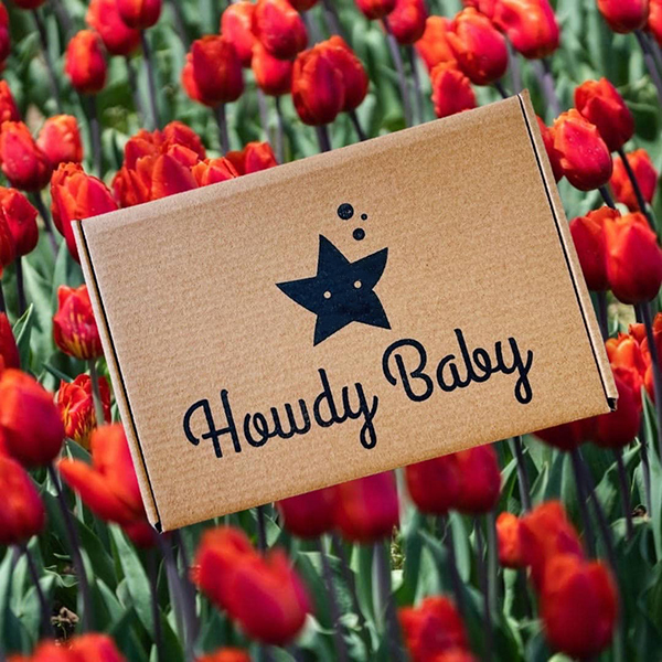 Howdy Baby subscription box for toddlers and kids May 2022 tulip theme
