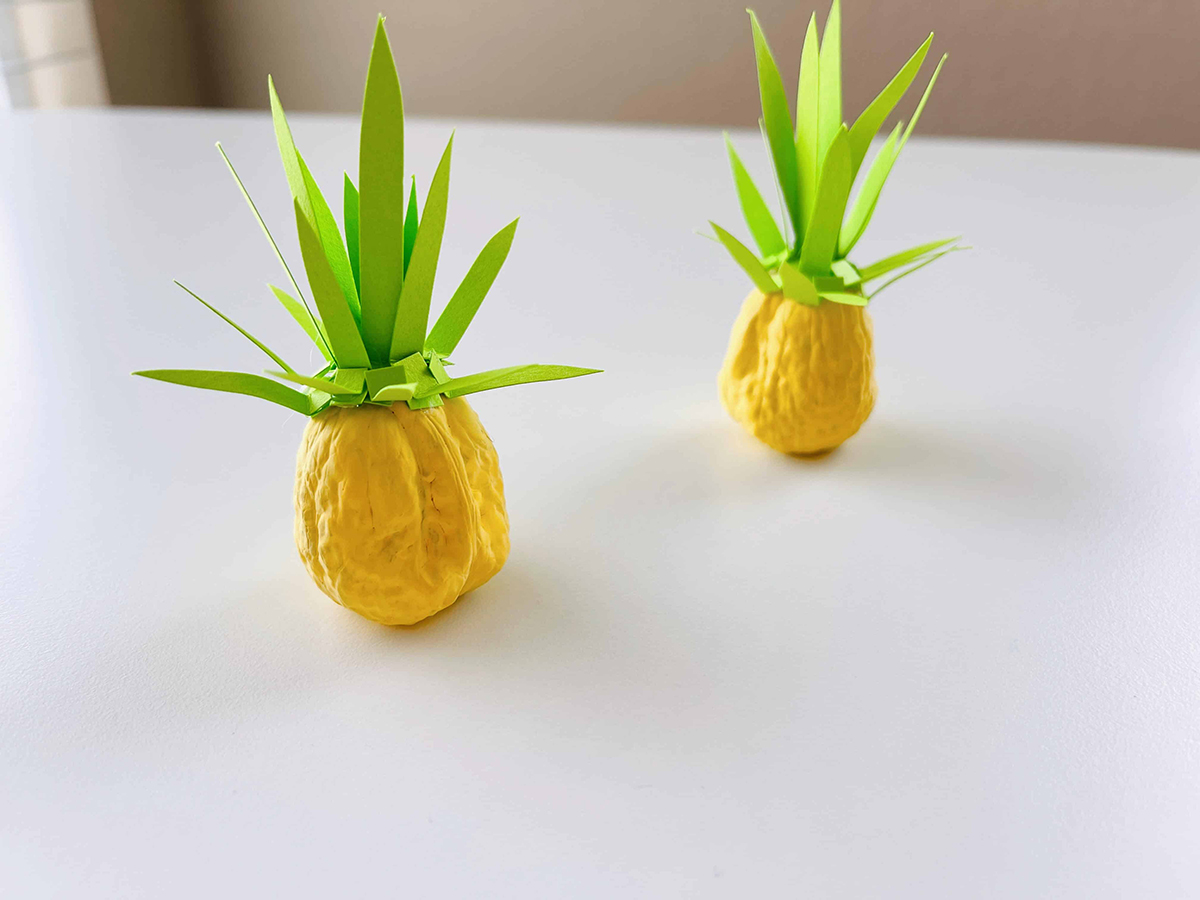 painted walnut pineapple summer craft idea