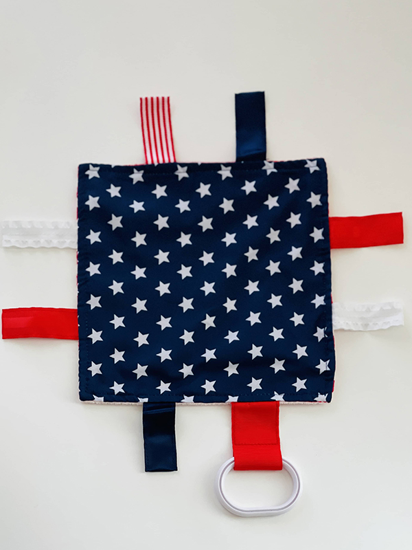 stars and stripes taggy sensory toy for babies and toddlers
