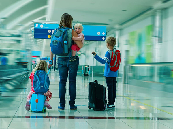 mom traveling with 3 toddlers on a plane