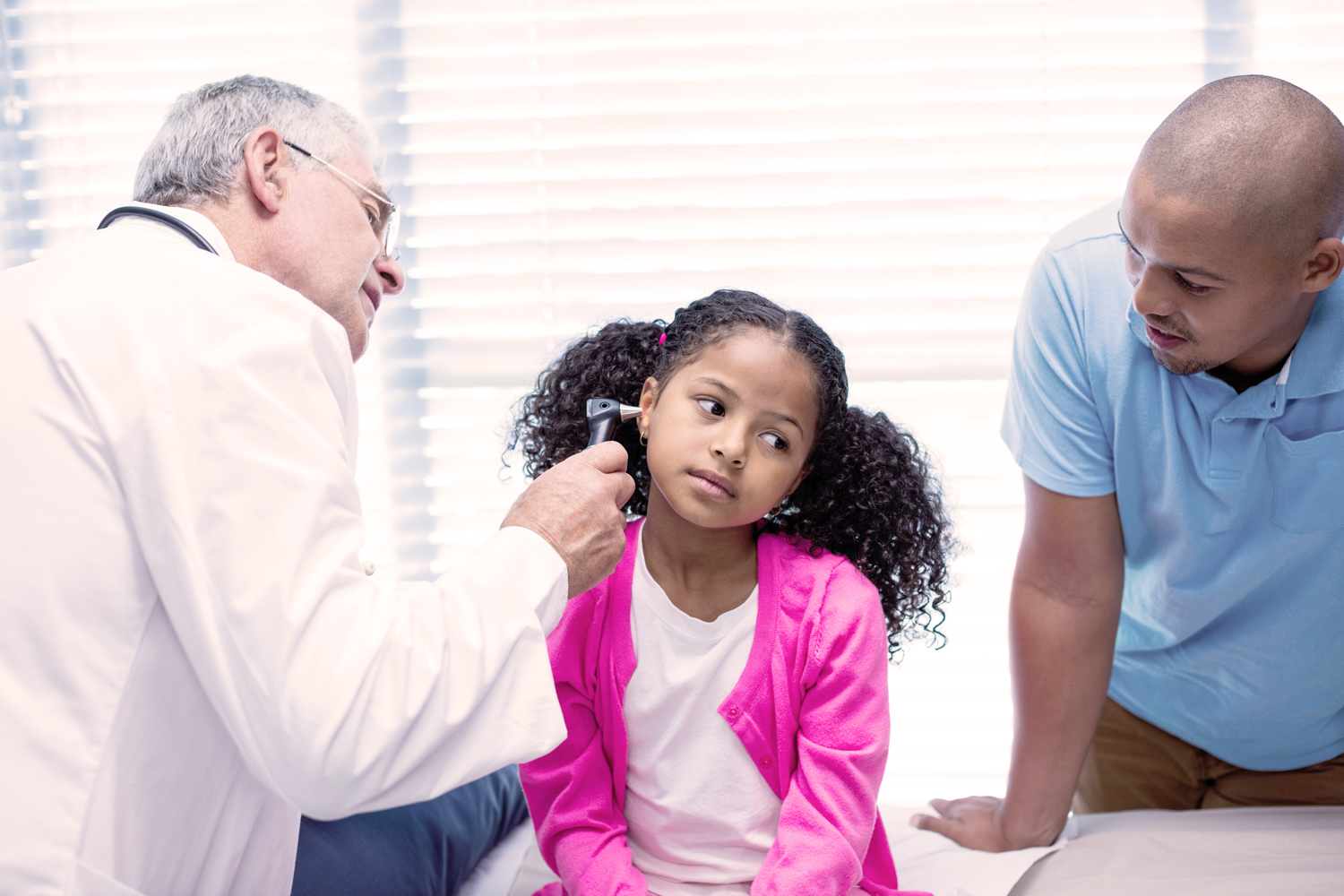 203-doctor-web-examining-patients-ear-with-otoscope-cp84vy7.jpg