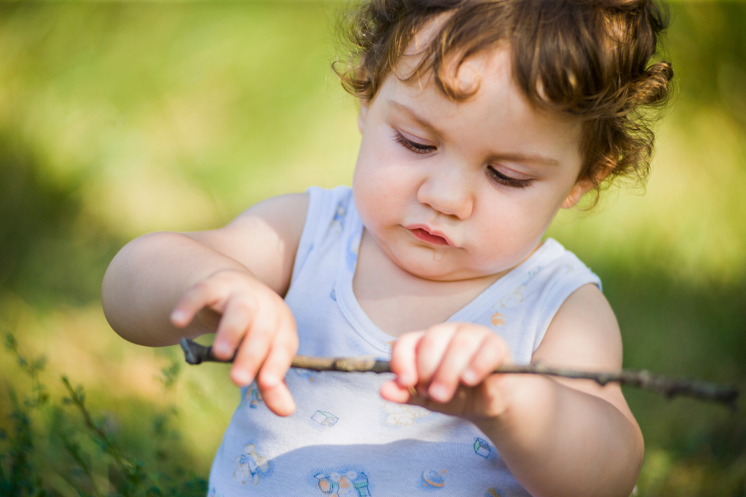 mamafrog eco-friendly baby products baby with stick