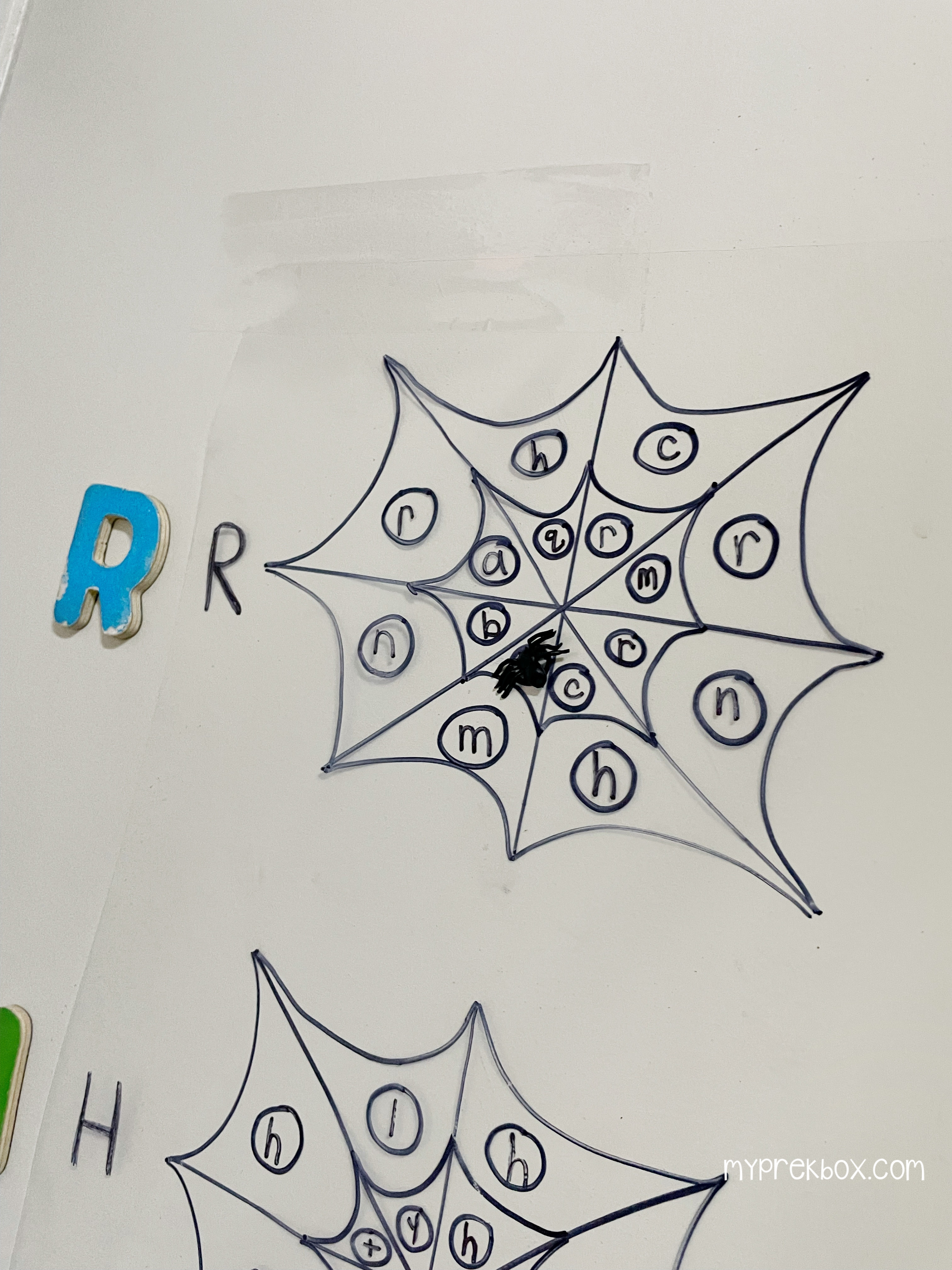 Preschool Halloween letter recognition Activity, letters and a spider web