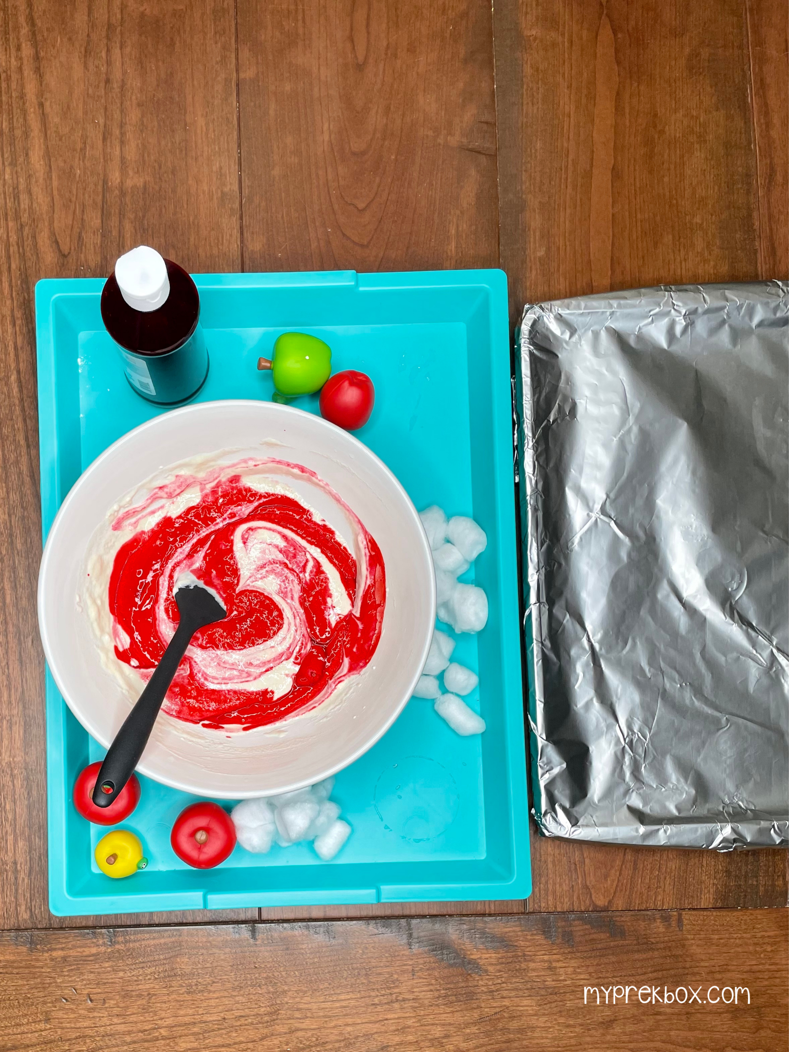 apple smash, mixing in the red food coloring to the flour mixture