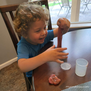 child playing clay 