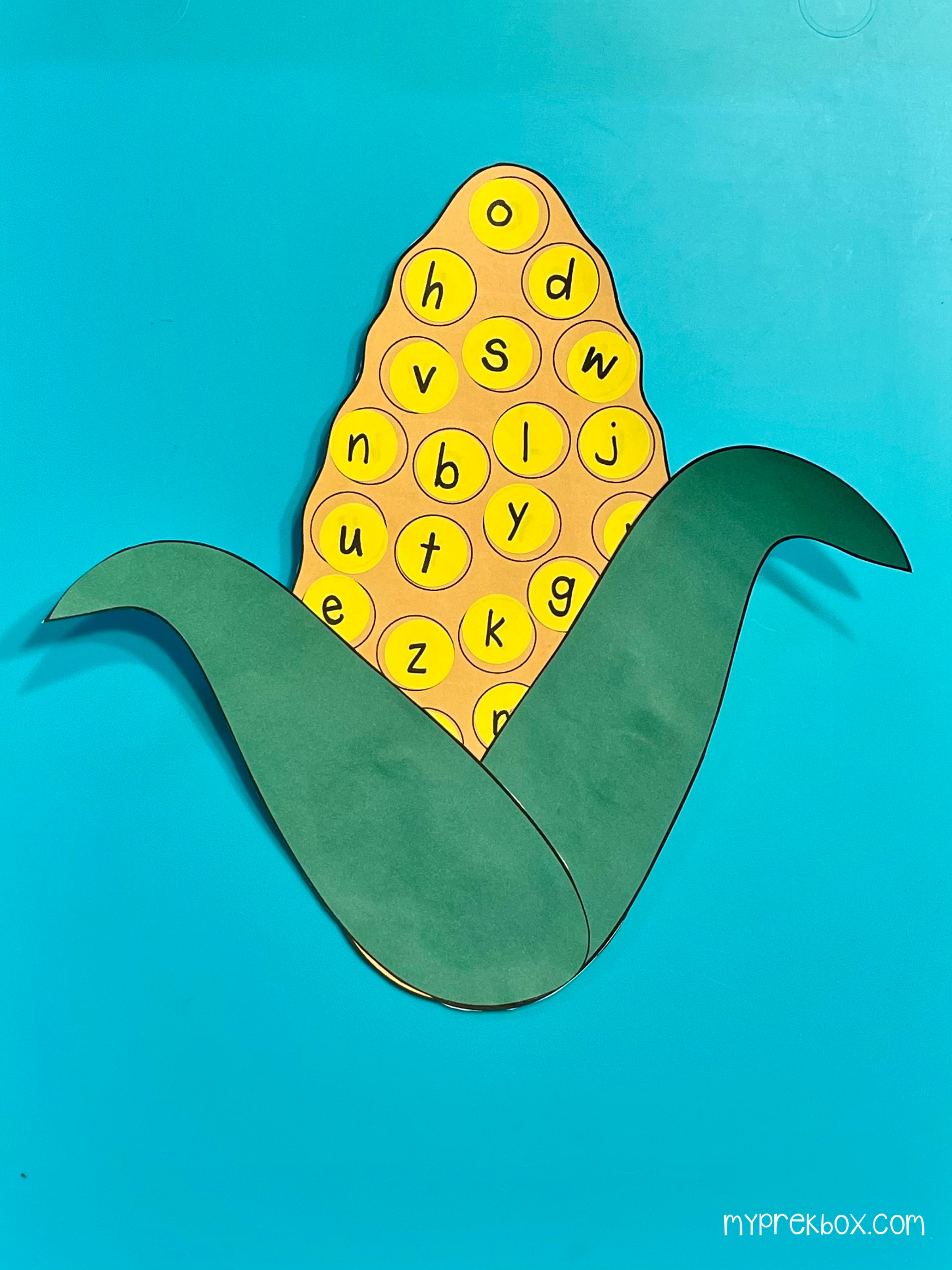 completed corn cob with letter stickers